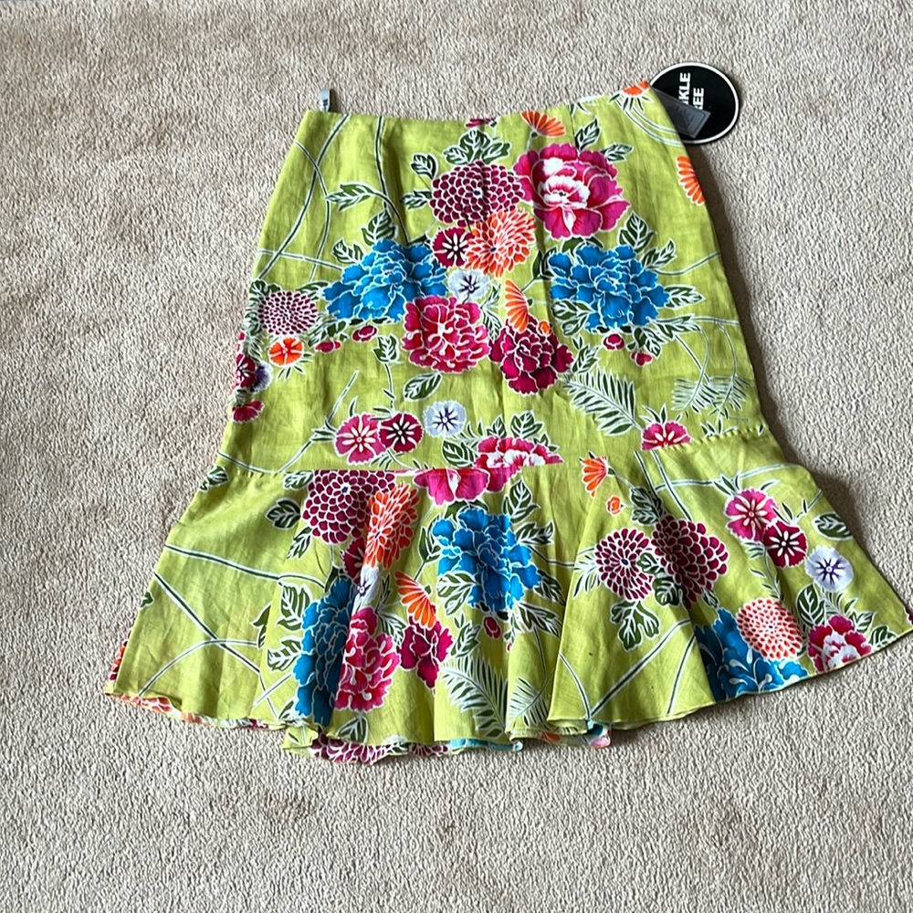 NWT ladies floral shirt with flutter bottom, top half lined, sz. 10, side zipper